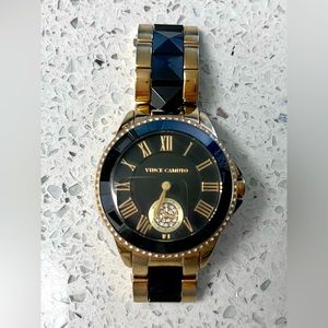 Vince Camuto studded watch with faux diamonds.